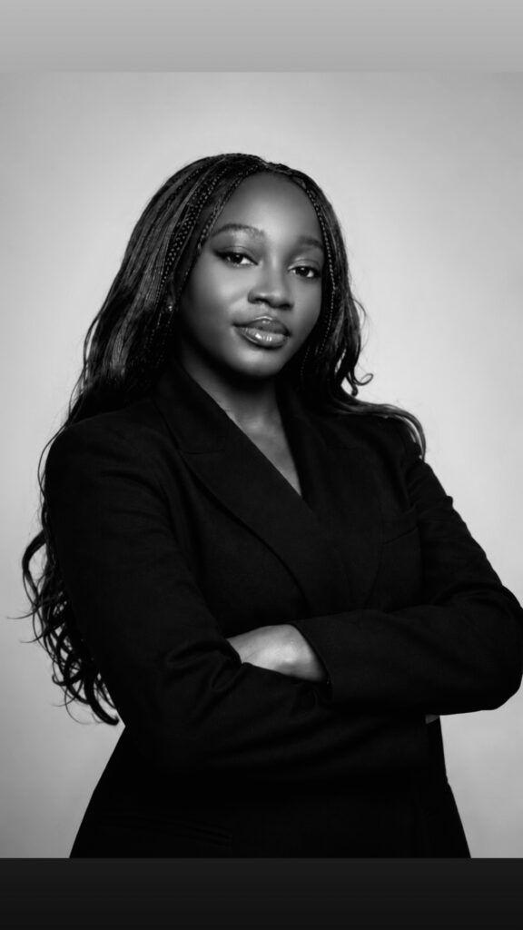 Black-and-white portrait of Dr. Phi Owusu, host of The Transformed Minds podcast